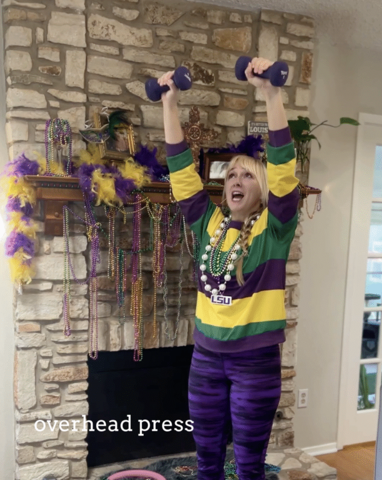 The standing dumbbell overhead press is a fantastic way to practice catching beads, coconuts, footballs, whatever you want to catch!